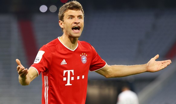 epa08477998 Bayern Munich's Thomas Mueller reacts during the German DFB Cup semi final soccer match between Bayern Munich and Eintracht Frankfurt in Munich, Germany, 10 June 2020. EPA/KAI PFAFFEN ...