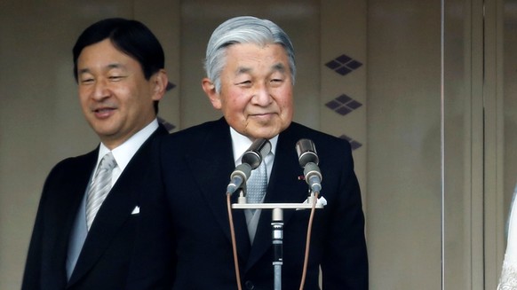 Japan&#039;s Crown Prince Naruhito (L-R), Emperor Akihito, Crown Princess Masako and Empress Michiko stand during a public appearance for New Year celebrations at the Imperial Palace in Tokyo January  ...