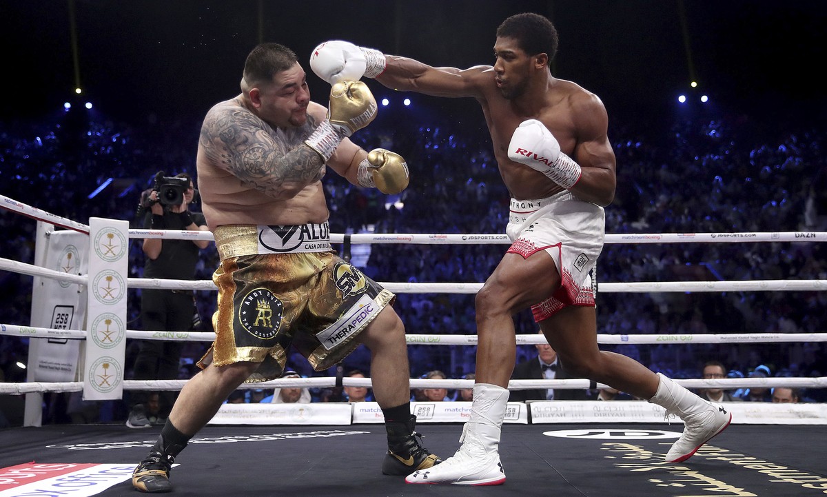 Defending champion Andy Ruiz Jr., left, during his fight against Britain's Anthony Joshua in their World Heavyweight Championship contest at the Diriyah Arena, Riyadh, Saudi Arabia. (Nick Potts/P ...