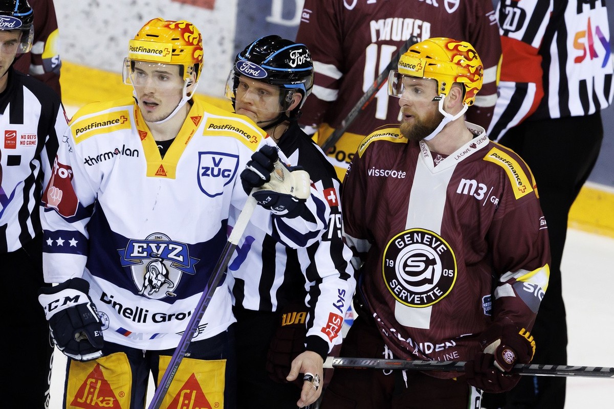 PostFinance Top Scorer Zug's forward Dario Simion, left, and PostFinance Top Scorer Geneve-Servette's forward Tanner Richard, right, react, during the first leg of the National League Swiss  ...