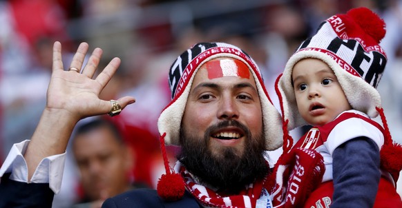 epa06813660 Supporters of Peru cheer prior to the FIFA World Cup 2018 group C preliminary round soccer match between Peru and Denmark in Saransk, Russia, 16 June 2018.

(RESTRICTIONS APPLY: Editoria ...