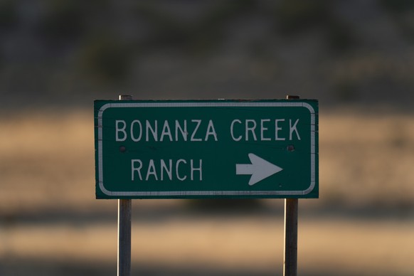 A sign stands near the Bonanza Creek Film Ranch in Santa Fe, N.M., Saturday, Oct. 23, 2021. An assistant director unwittingly handed actor Alec Baldwin a loaded weapon and told him it was safe to use  ...
