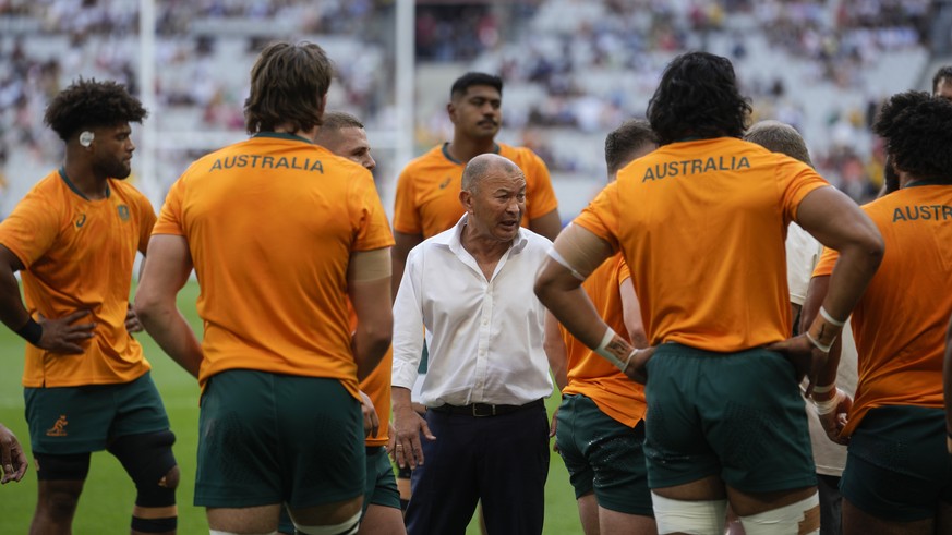 CORRECTS COACH NAME Australia&#039;s head coach Eddie Jones speaks to his squad prior to the Rugby World Cup Pool C match between Australia and Georgia at the Stade de France in Saint-Denis, north of  ...