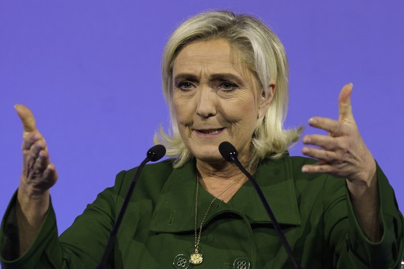 epa10993371 Marine Le Pen, president of France&#039;s Rassemblement National, speaks at the opening of Identity and Democracy public meeting in Lisbon, Portugal, 24 November 2023. EPA/TIAGO PETINGA