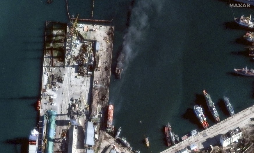This satellite image provided by Maxar Technologies shows the aftermath of the reported attack on the Russian Ropucha-class landing ship, at the eastern Crimean port of Feodosia on Tuesday, Dec. 26, 2 ...