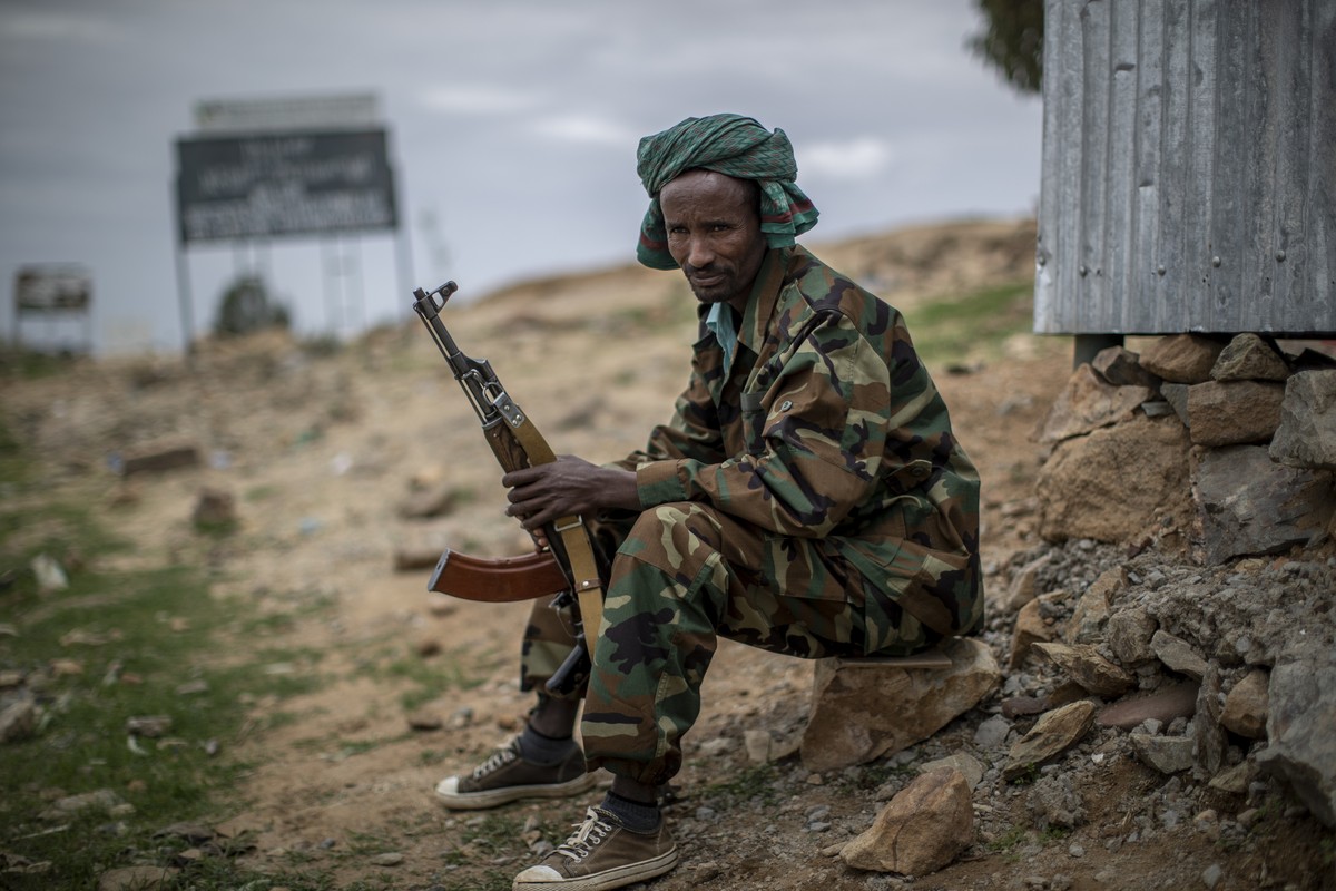 FILE - A fighter loyal to the Tigray People's Liberation Front (TPLF) mans a guard post on the outskirts of the town of Hawzen in the Tigray region of northern Ethiopia on May 7, 2021. Prime Mini ...