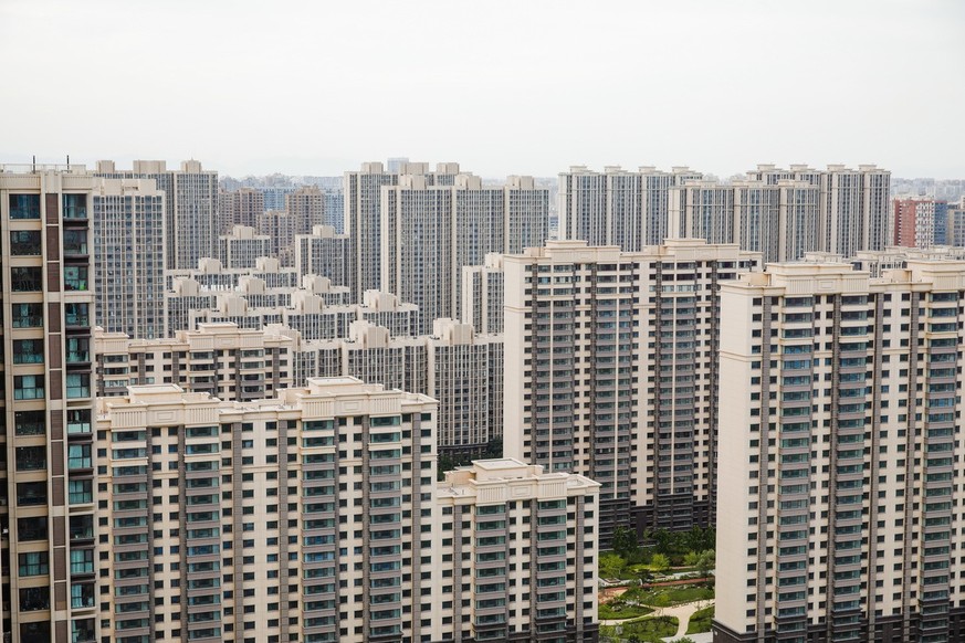 epa10072389 Residential buildings in Beijing, China, 15 July 2022. China&#039;s investment in real estate development fell by 5.4 percent year-on-year in the first half of 2022, down to around 1,009.5 ...