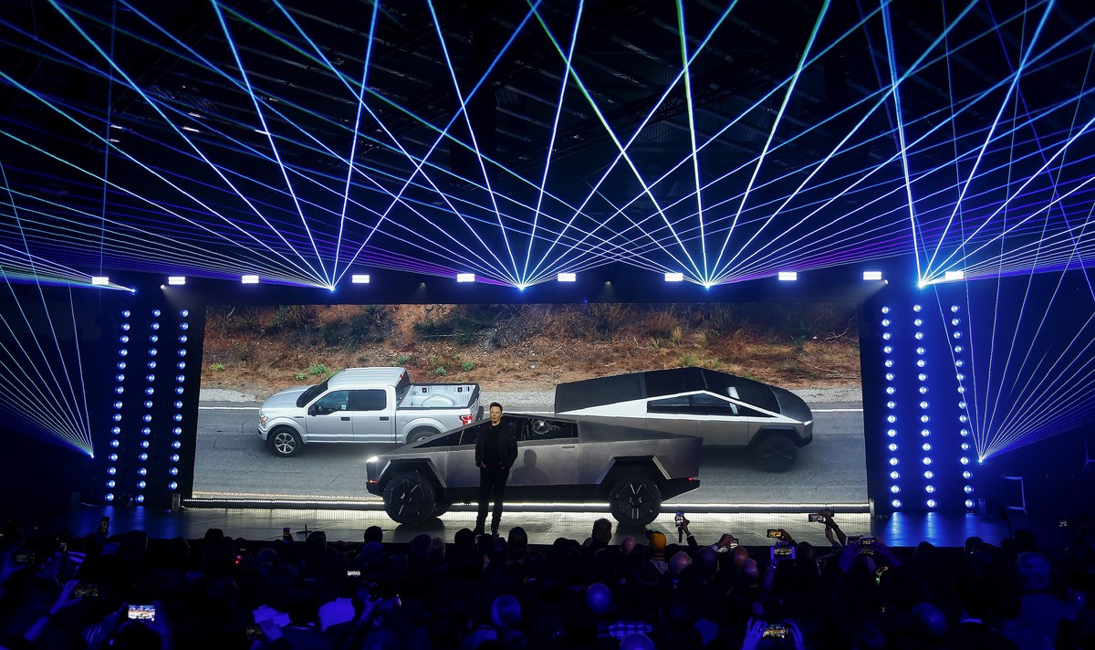FILE - In this Nov. 21, 2019, file photo, Tesla CEO Elon Musk introduces the Cybertruck at Tesla's design studio in Hawthorne, Calif. Tesla has received nearly 150,000 orders for its new electric ...