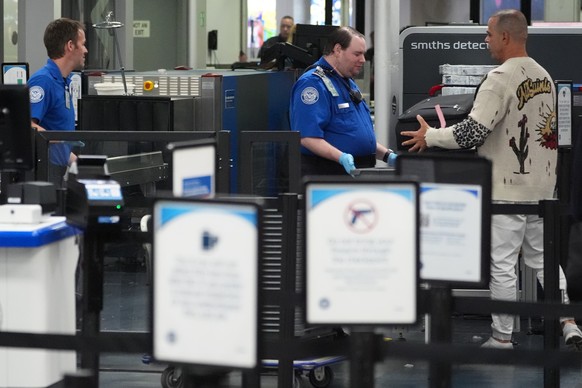 A traveler goes through the TSA security checkpoint at Hollywood Burbank Airport (BUR), in Burbank, Calif., Monday, March 30, 2026. (AP Photo/Damian Dovarganes)
Travel Delays