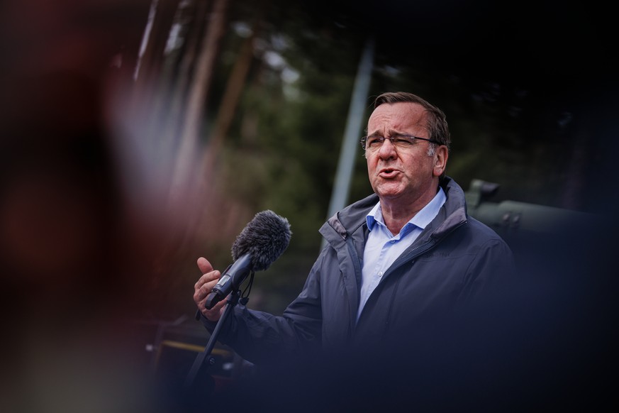 epa10610185 German Defense Minister Boris Pistorius talks to the media as he attends a training of Ukrainian soldiers during a visit to the Federal Armed Forces (Bundeswehr) training hub in Klietz, Ge ...