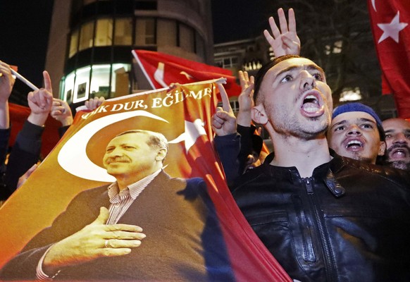 Crowds gather to welcome the Turkish Family Minister Fatma Betul Sayan Kaya, who decided to travel to Rotterdam by land after Turkish Foreign Minister Mevlut Cavusoglu&#039;s flight was barred from la ...