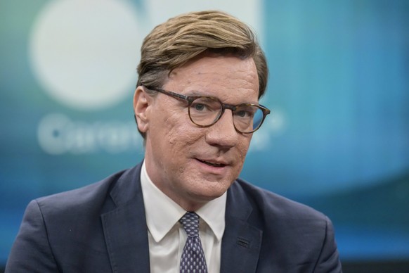 In the picture, from left: Nico Lange, political scientist and security expert, GER, Berlin, studio, guest on Caren Miosga s political talk show, TV, format, with presenter, Das Erste, from Adlershof  ...