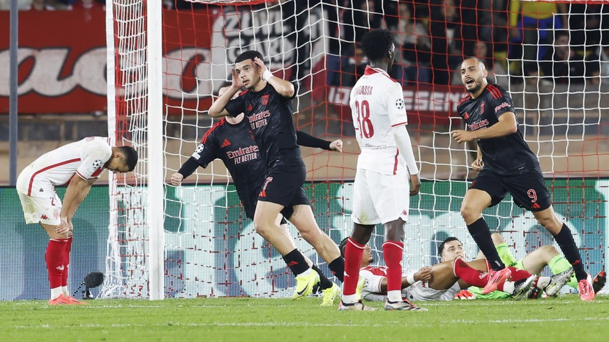 epa11744599 Zeki Amdouni of Benfica (C) celebrates after scoring the equalizer during the UEFA Champions League match between AS Monaco and Benfica in Monaco, Monaco, 27 November 2024. EPA/SEBASTIEN N ...