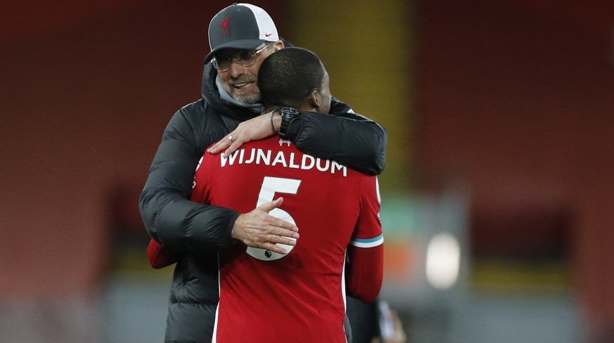 Liverpool&#039;s manager Jurgen Klopp celebrates with Liverpool&#039;s Georginio Wijnaldum at the end of the English Premier League soccer match between Liverpool and Southampton at Anfield stadium in ...