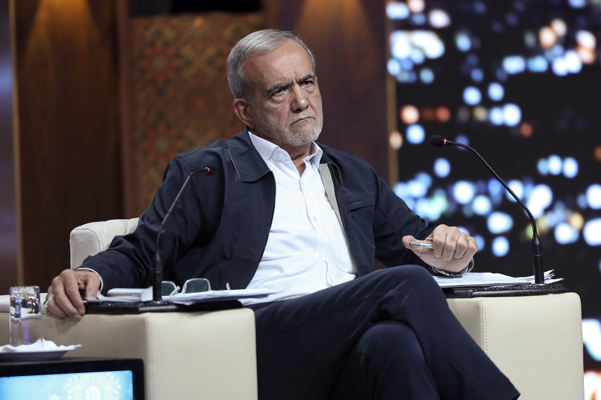 In this picture made available by Iranian state-run TV, IRIB, reformist presidential candidate for June 28, election Masoud Pezeshkian, who is a parliament member, attends a debate of the candidates a ...