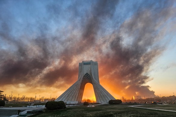 FILE - Smoke rises behind the Azadi (Freedom) monument in Tehran, Iran, on March 3, 2026, following the U.S.-Israeli military attack. (Davoud Ghahrdar/ISNA via AP, File)
Russia Iran Cautious Stance