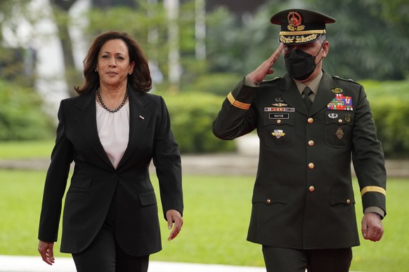 U.S. Vice President Kamala Harris, left, reviews an honor guard at the Malacanang presidential palace in Manila, Philippines on Monday, Nov. 21, 2022. AP Photo/Aaron Favila, Pool)
Kamala Harris