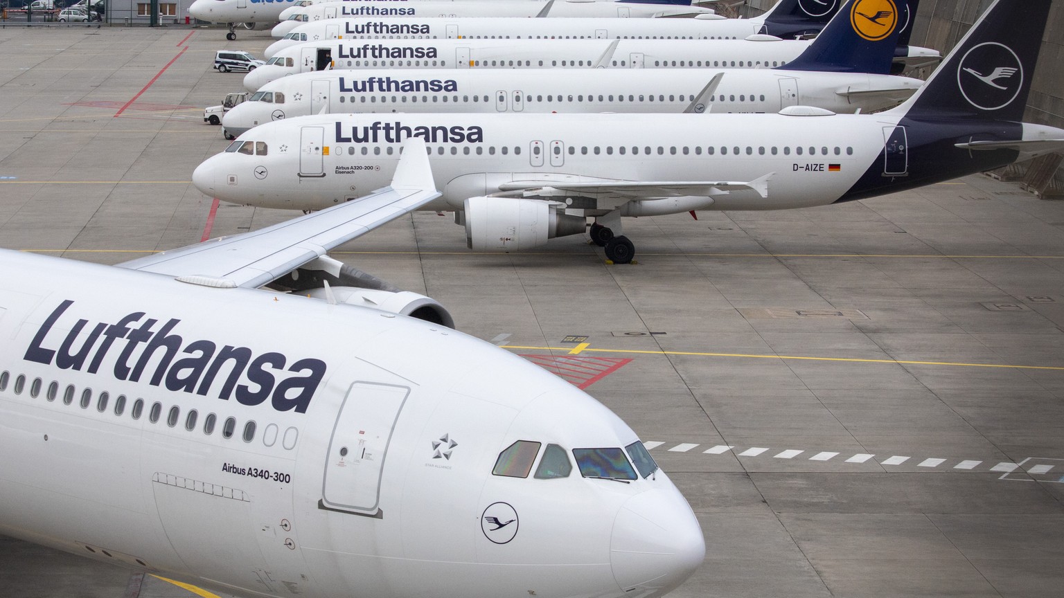epa11215797 Lufthansa planes are seen stationed, at Frankfurt Airport, in Frankfurt am Main, Germany, 12 March 2024. The UFO cabin crew union has called on its members to strike, to press their demand ...
