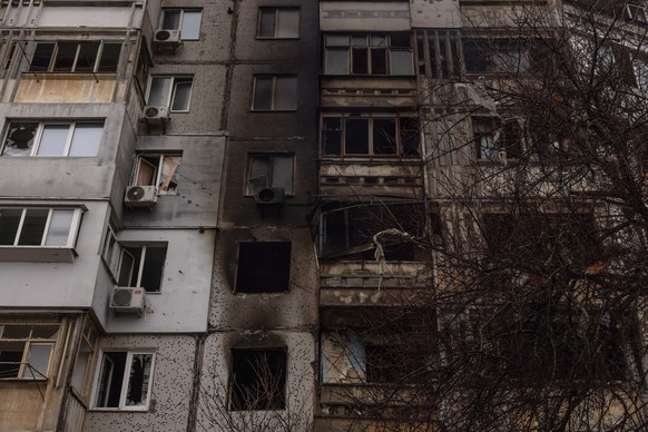 epa10327789 A damaged residential building after the recent Russian attack in Kherson, southern Ukraine, 25 November 2022. Russian troops for the past few days intensified the shelling of Kherson. On  ...