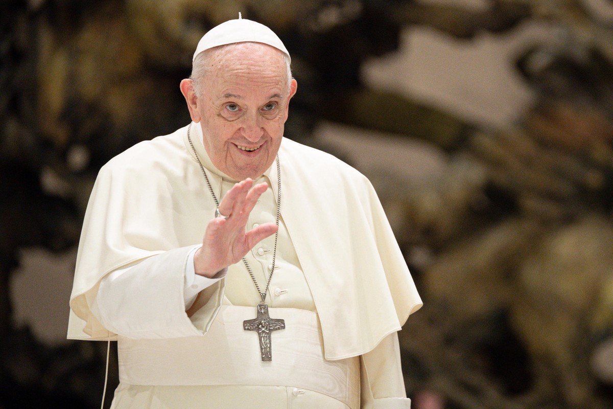 epa09428877 A handout picture provided by the Vatican Media shows Pope Francis meeting the faithful during his Wednesday General Audience, at Paul VI Hall in Vatican City, Vatican, 25 August 2020. EPA ...