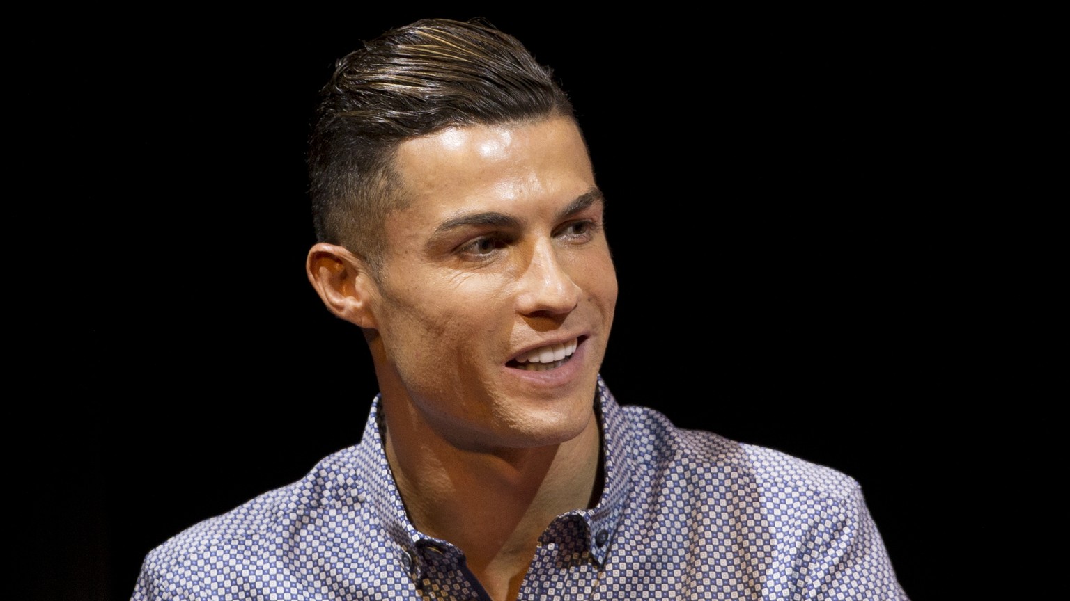 FILE - In this Monday, July 29, 2019 file photo Juventus soccer player Cristiano Ronaldo speaks in Madrid, Spain. Ronaldo's lawyers have filed public court documents following a judge's decision not t ...