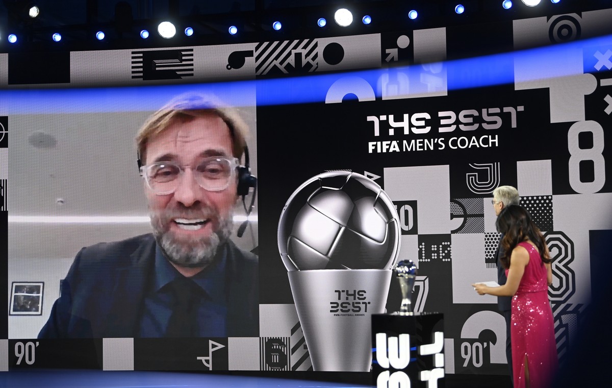 epa08890366 Liverpool manager Juergen Klopp appears on the screen after winning the Best FIFA Men's Coach Award during the Best FIFA Football Awards virtual TV show broadcast from the FIFA headqu ...