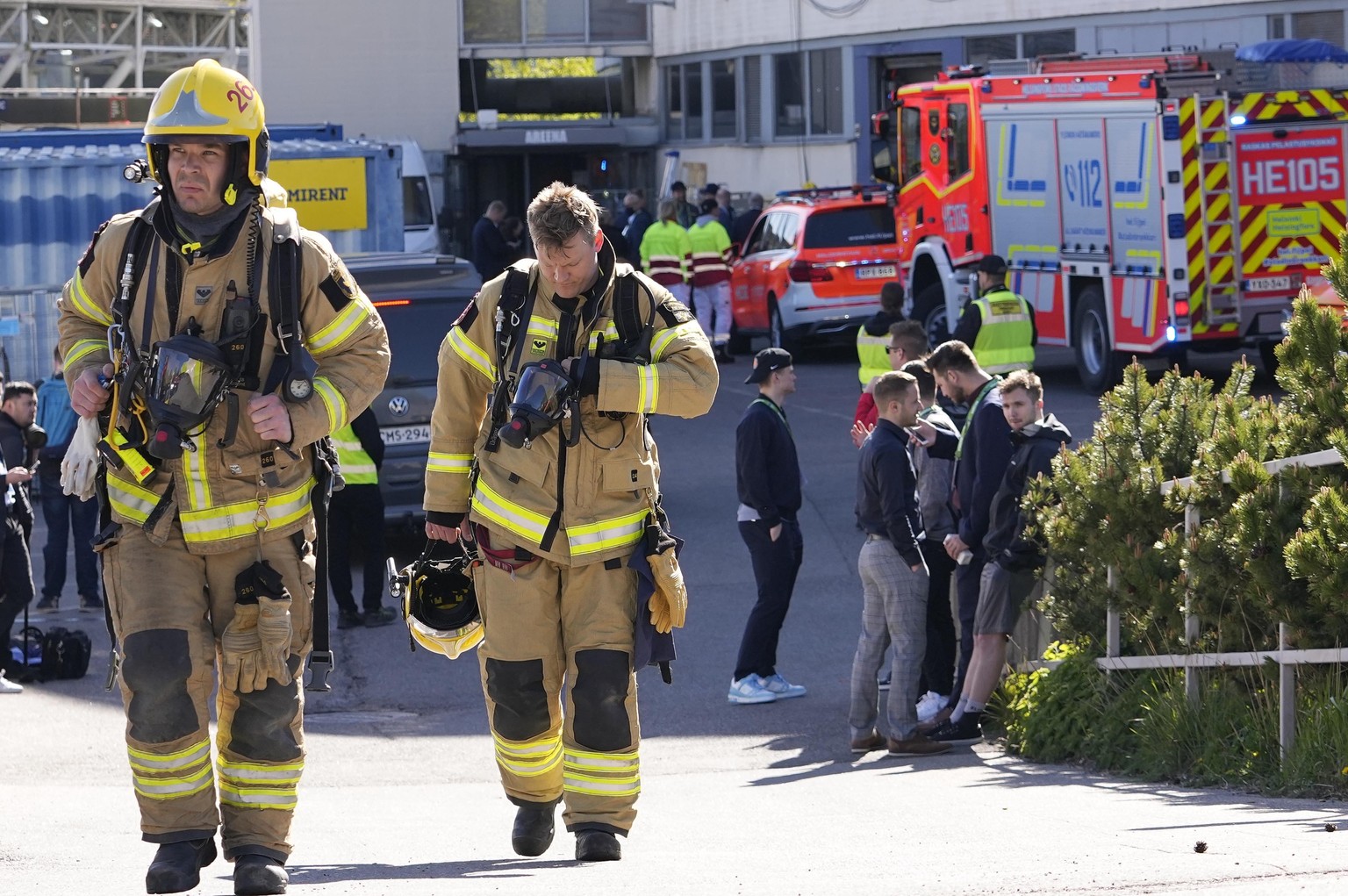 Firefighters leaving the closed Helsinki Ice Hall where the group A Hockey World Championship match between Denmark and Germany was scheduled in Helsinki, Finland, Thursday May 19, 2022. The hall was  ...