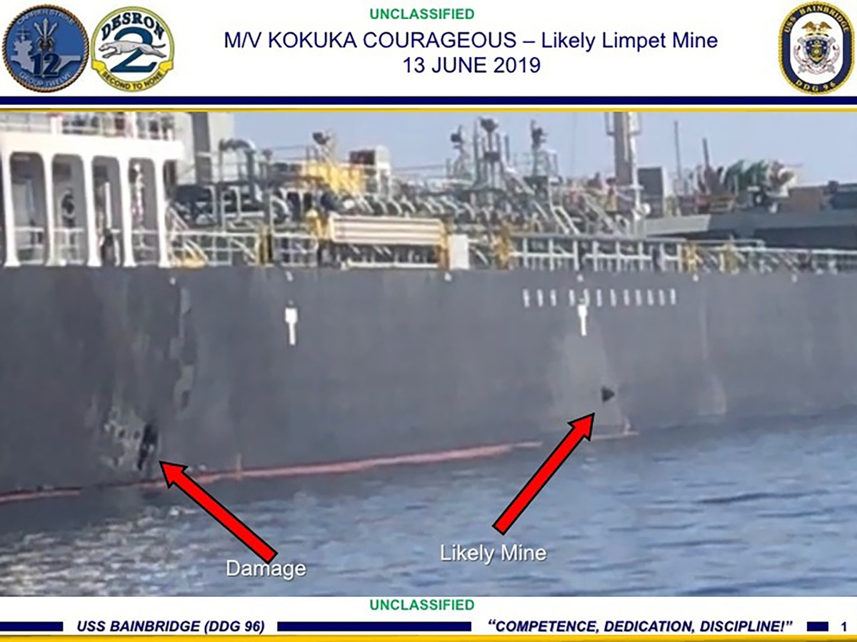 This June 13, 2019, image released by the U.S. military's Central Command, shows damage and a suspected mine on the Kokuka Courageous in the Gulf of Oman near the coast of Iran. The U.S. military ...