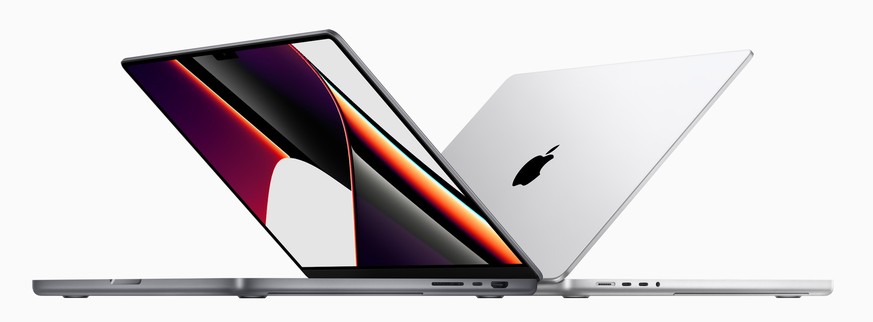 epa09530719 A handout photo made available by Apple Inc. showing the new 14- and 16-inch MacBook Pro with M1 Pro and M1 Max delivering performance and battery life, and features the world?s best noteb ...