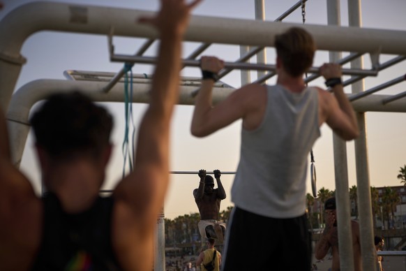 People work out in an open-air gym next to the beach in Barcelona, Spain, Tuesday, June 25, 2025. (AP Photo/Emilio Morenatti)
Spain Be Well