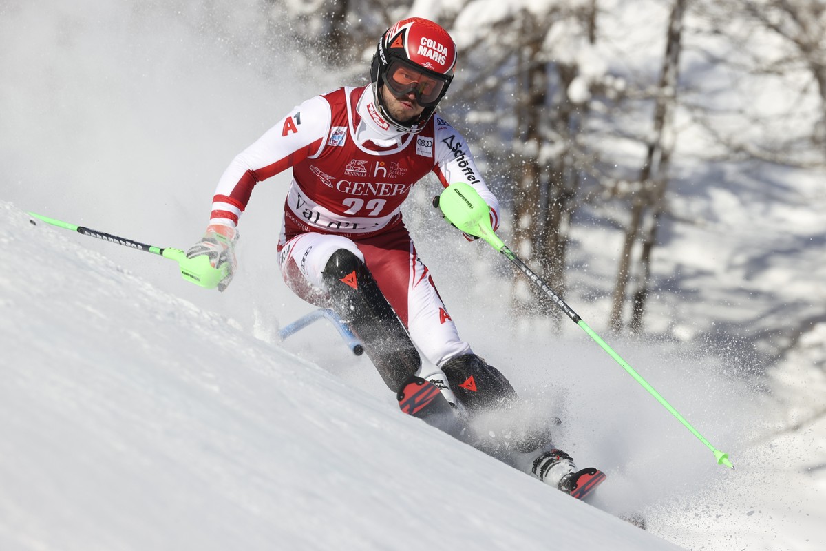 Austria's Christian Hirschbuehl competes in an alpine ski, men's World Cup slalom, in Val D'Isere, France, Sunday, Dec. 12, 2021. (AP Photo/Alessandro Trovati)