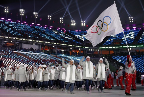 Athletes from Russia wave during the opening ceremony of the 2018 Winter Olympics in Pyeongchang, South Korea, Friday, Feb. 9, 2018. (AP Photo/Jae C. Hong)