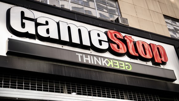 FILE - Pedestrians pass a GameStop store on 14th Street at Union Square, Thursday, Jan. 28, 2021, in the Manhattan borough of New York. Meme stock GameStop is gearing up to name Ryan Cohen as its chai ...