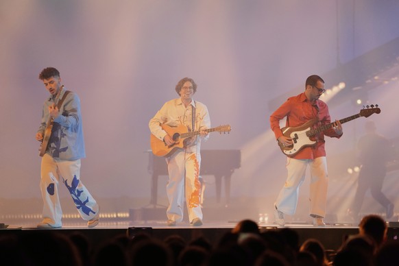 NAPA from Portugal performs the song &quot;Deslocado&quot; during the dress rehearsal for the first semi-final of the 69th Eurovision Song Contest, in Basel, Switzerland, Monday, May 12, 2025. (AP Pho ...