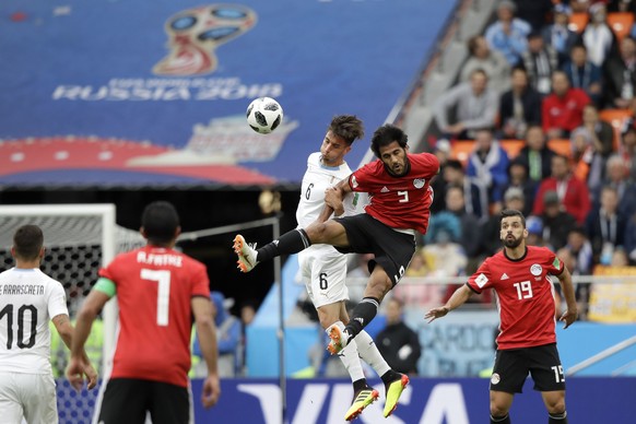 Uruguay&#039;s Rodrigo Bentancur, left, and Egypt&#039;s Marwan Mohsen challenge for the ball during the group A match between Egypt and Uruguay at the 2018 soccer World Cup in the Yekaterinburg Arena ...