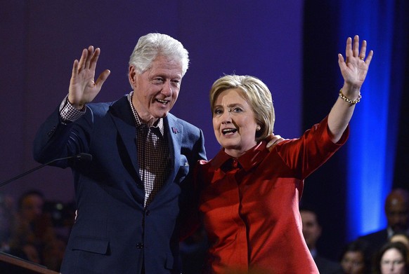 epaselect epa05173042 US Democratic Presidential candidate Hillary Clinton (R) with husband former US President Bill Clinton (L) celebrates her win in the Nevada caucus at Caesar&#039;s Palace Casino  ...