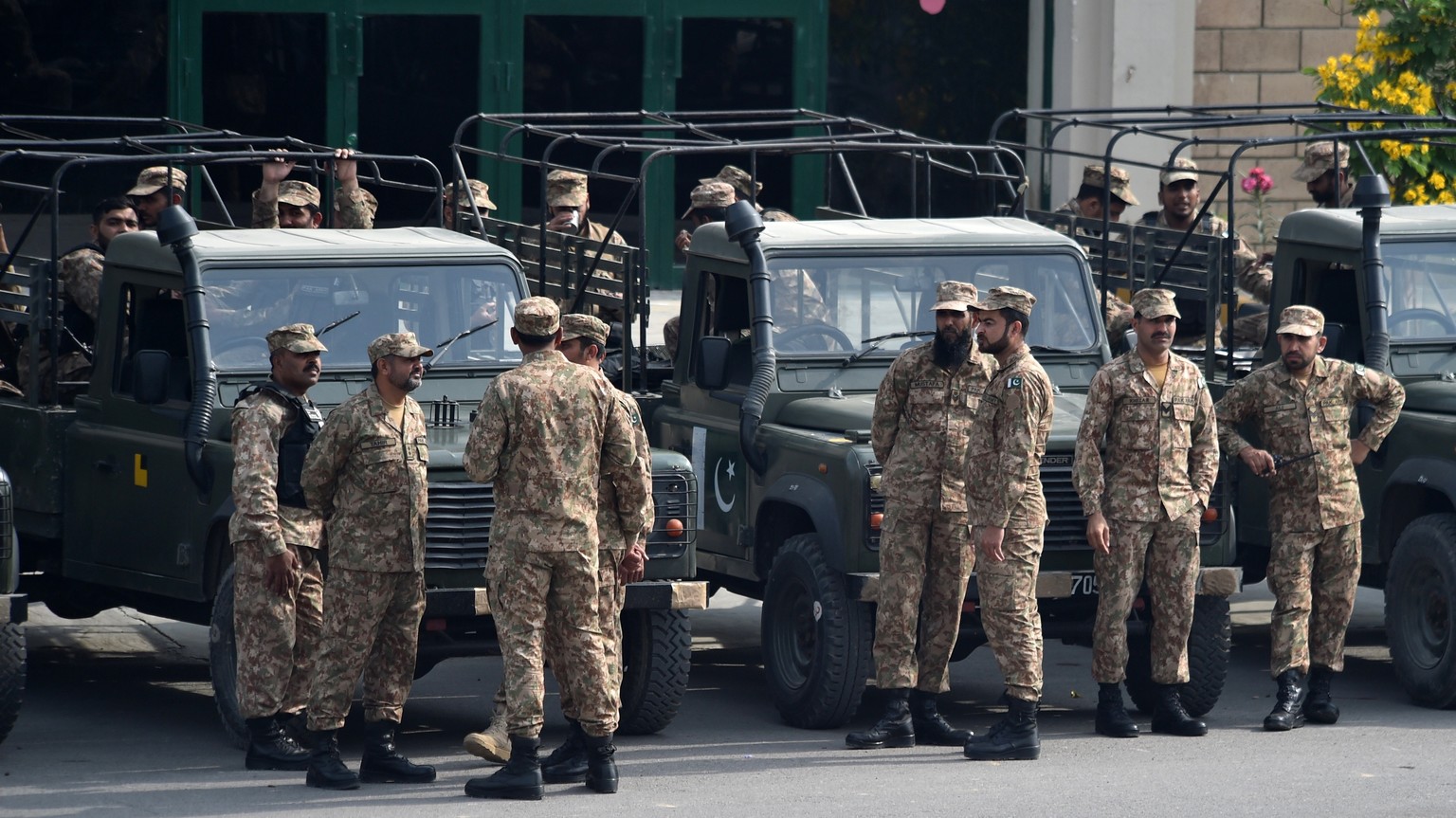 epa11133260 Pakistani Army personnel gather at an election materials distribution centre in Karachi, Pakistan, 07 February 2024. The Election Commission of Pakistan (ECP) has announced that general el ...