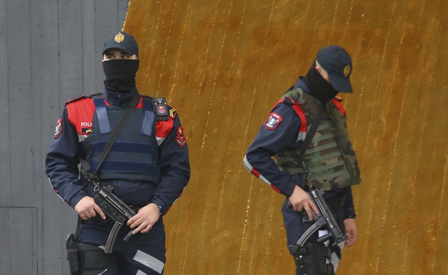 Albanian special police guard a hotel where the Israeli soccer team are staying, ahead of the World Cup qualifier soccer match against Albania, in downtown Tirana, Friday, Nov. 11, 2016. Albanian poli ...