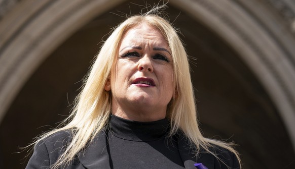 The mother of Archie Battersbee, Hollie Dance, speaks to the media outside the Royal Courts of Justice, London, Monday, July 25, 2022. The parents of a 12-year-old boy in Britain who was left in a com ...