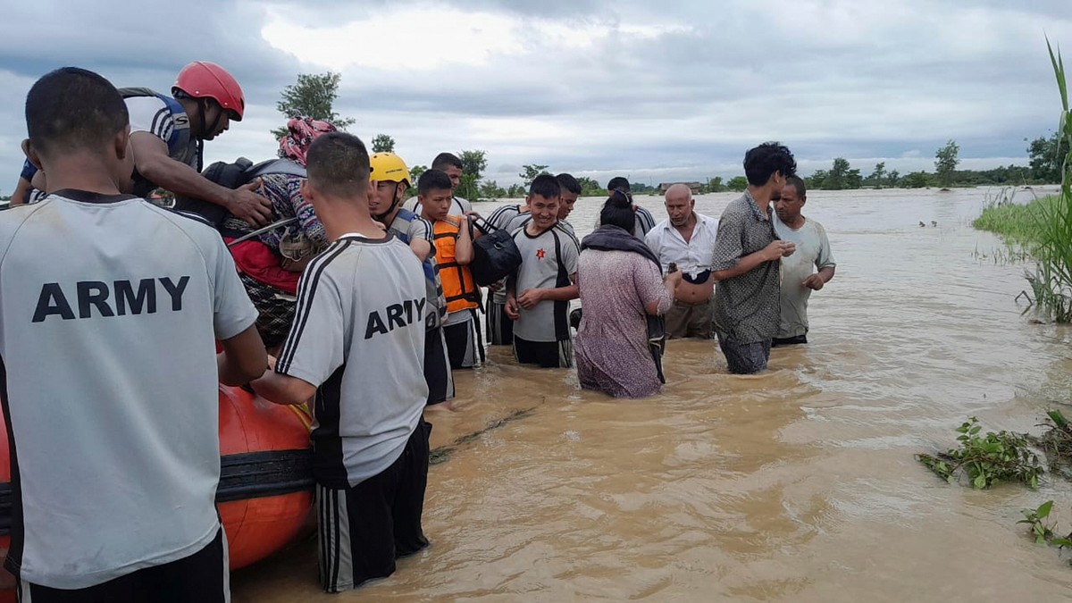 Nepalese army personnel transport survivors after a flood in Jhapa district east of Nepal, Sunday, Oct. 5, 2025. (Nepal Army via AP)
Nepal Landslides