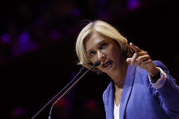 epa09299715 Ile-de-France region president Valerie Pecresse delivers a speech during a political rally as part of her campaign for the 2021 Regional Elections in Paris, France, 24 June 2021. The secon ...