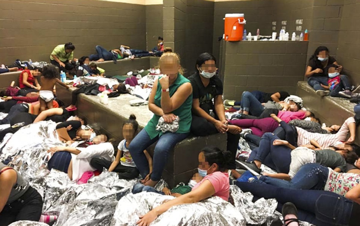 epa07690956 A handout photo made available by the Office of the Inspector General made available on 02 July 2019 shows overcrowded conditions at the US Border Patrol's McAllen holding station in  ...