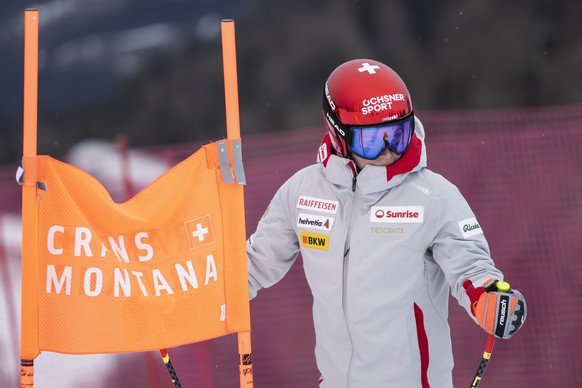 Corinne Suter of Switzerland inspects the course ahead of a training session for the women's Downhill race at the Alpine Skiing FIS Ski World Cup, in Crans-Montana, Switzerland, Wednesday, Januar ...