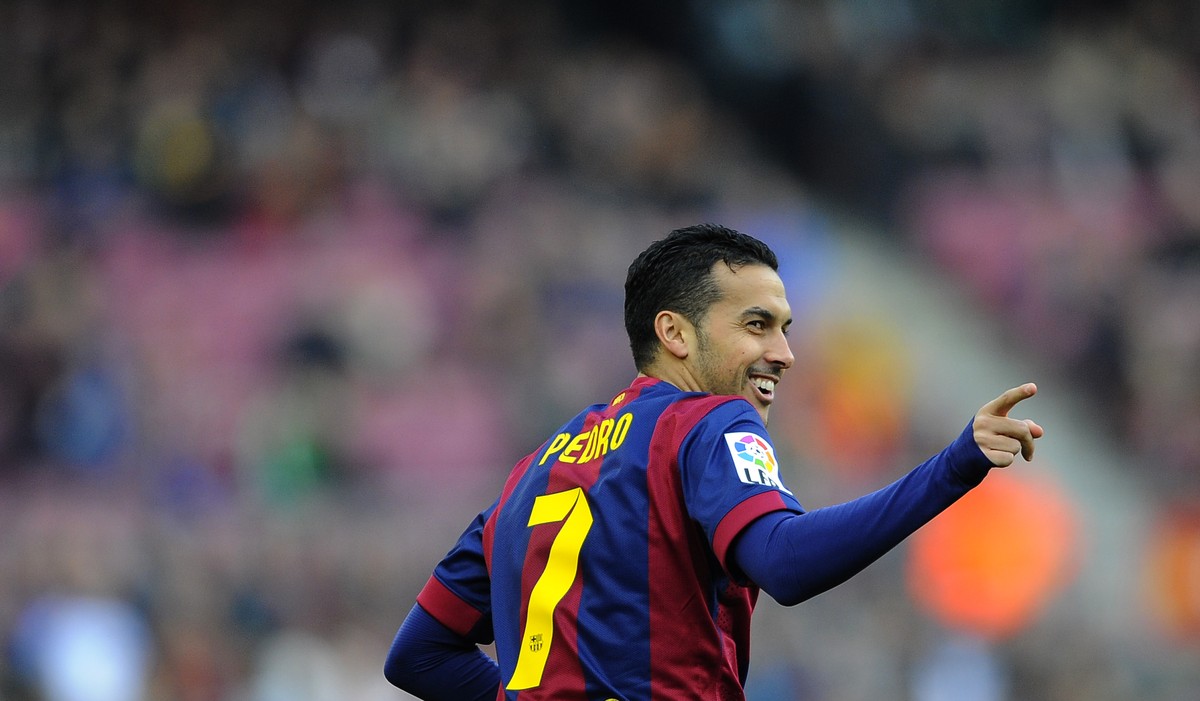 FC Barcelona's Pedro Rodriguez, reacts after scoring against Cordoba, during a Spanish La Liga soccer match at the Camp Nou stadium in Barcelona, Spain, Saturday, Dec. 20, 2014. (AP Photo/Manu Fe ...