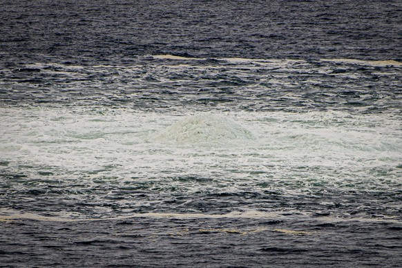 This photo from the Armed Forces of Denmark shows the disturbance in the water above the gas leak, in the Baltic Sea, Thursday, September 29, 2022. Following the suspected sabotage this week o ...