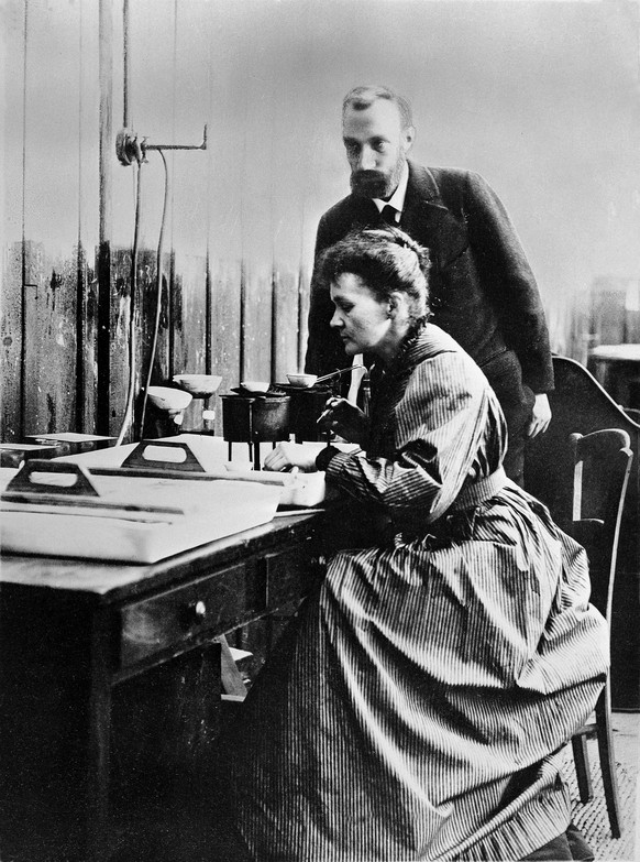 L0001761 Pierre and Marie Curie at work in laboratory
Credit: Wellcome Library, London. Wellcome Images
images@wellcome.ac.uk
http://wellcomeimages.org
Pierre and Marie Curie at work in a
laboratory.
 ...