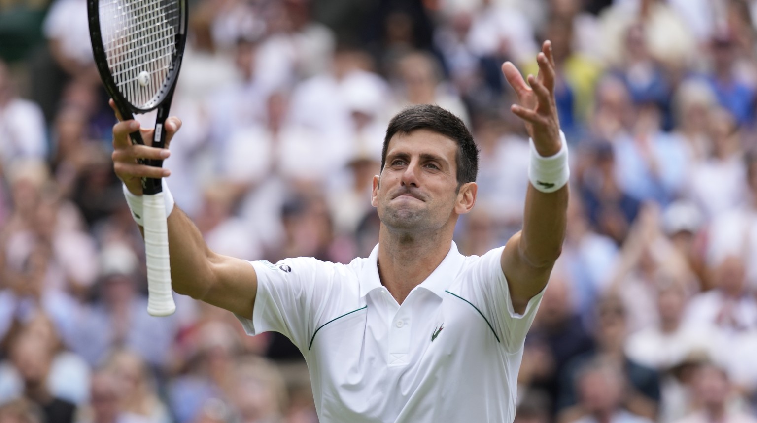 Serbia&#039;s Novak Djokovic celebrates after defeating Chile&#039;s Cristian Garin during the men&#039;s singles fourth round match on day seven of the Wimbledon Tennis Championships in London, Monda ...