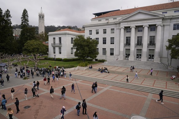 FILE - Students walk through Sproul Plaza on the University of California, Berkeley campus on March 29, 2022, in Berkeley, Calif. An anthropology professor at the university whose identity as Native A ...