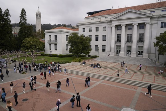 FILE - Students walk through Sproul Plaza on the campus of the University of California, Berkeley on March 29, 2022 in Berkeley, California.  A university anthropology professor whose identity as Native A...