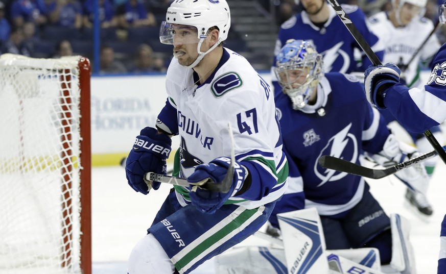 Vancouver Canucks left wing Sven Baertschi (47) celebrates after scoring past Tampa Bay Lightning goaltender Andrei Vasilevskiy (88) during the third period of an NHL hockey game Thursday, Feb. 8, 201 ...